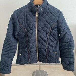 Royalty for Me Quilted Navy Moto Jacket with brown piping and faux fur lining.